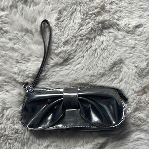 Hello Kitty | metallic silver clutch black bow charm